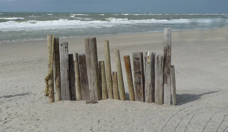 Paaltjes op het strand