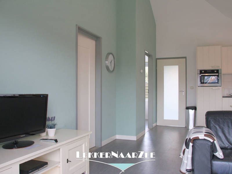 Woonkamer en Tv vakantiehuis aan zee